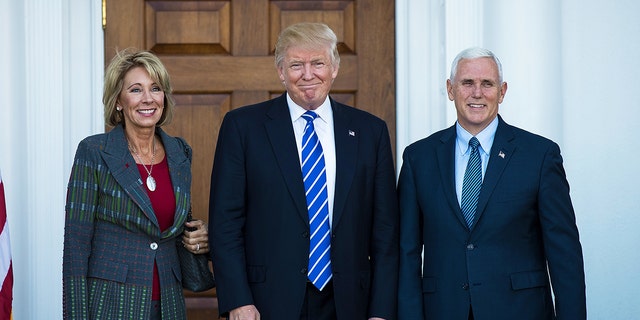 Betsy DeVos, Donald Trump, Mike Pence