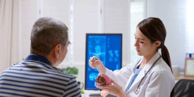 Dementia doctor with patient