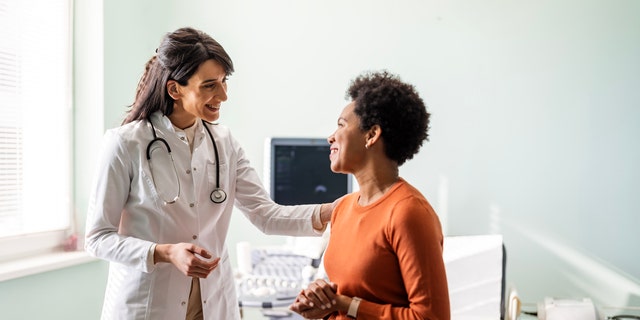 Doctor with patient