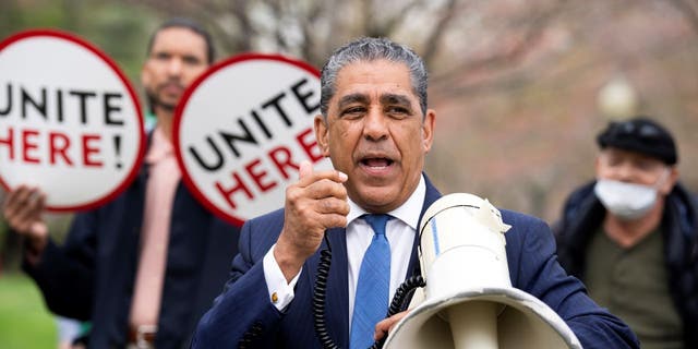 Adriano Espaillat with bullhorn