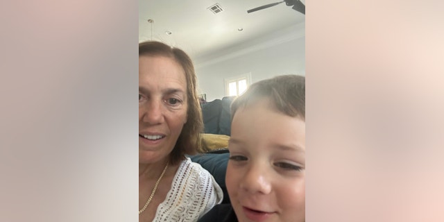 Sandy Caterine with grandson