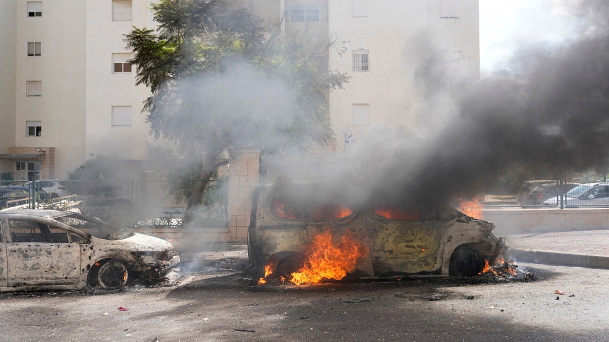 Car on fire in street