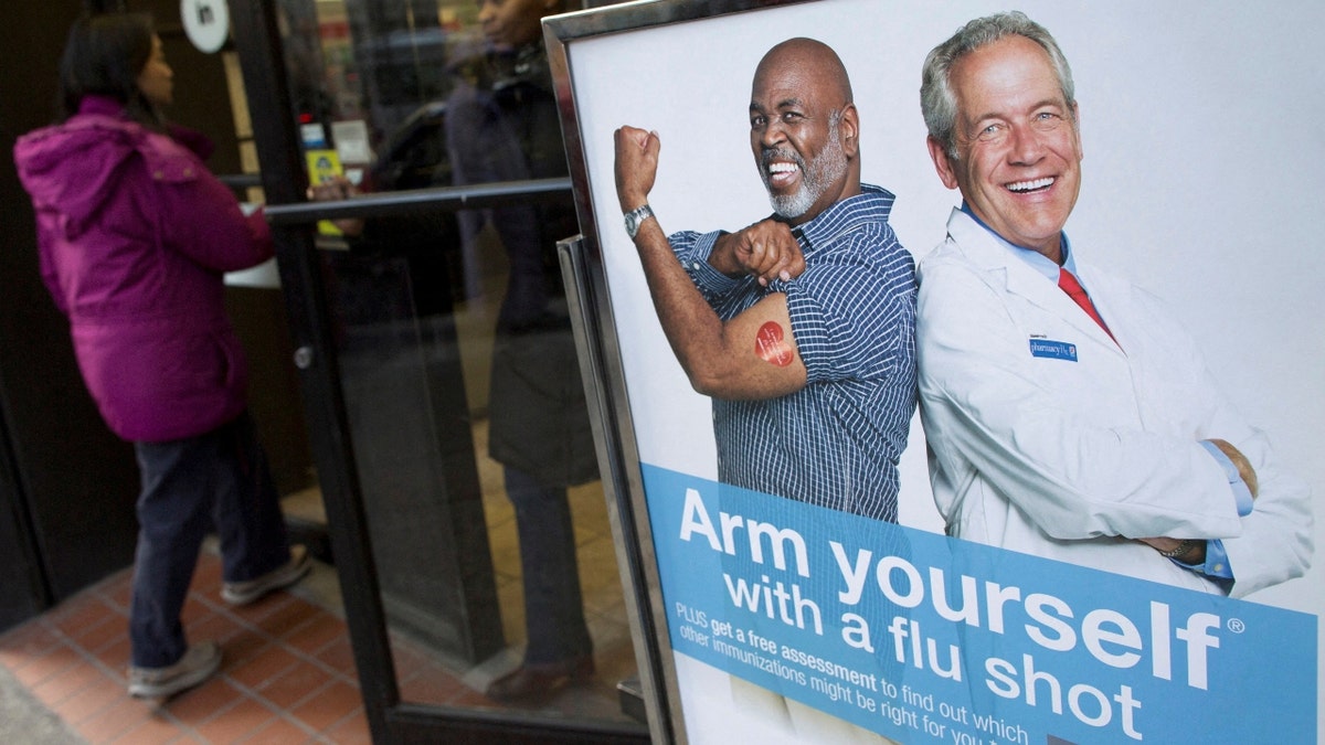 A sign promoting flu shots