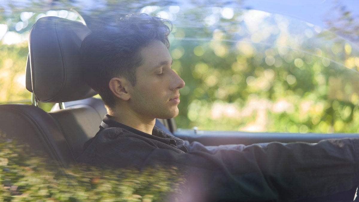 Teen boy driving