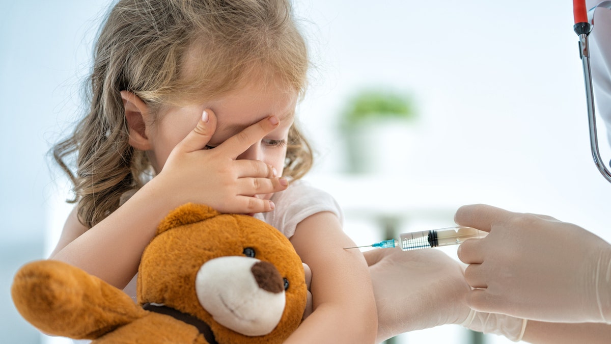 Toddler getting vaccine