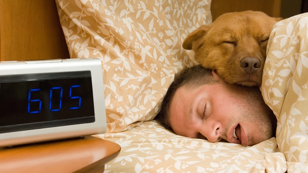 man sleeps with mouth open