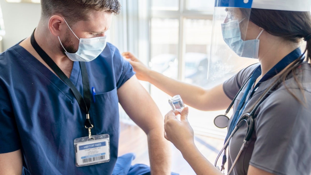 Nurse getting vaccine