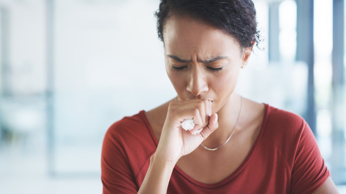 Woman coughing