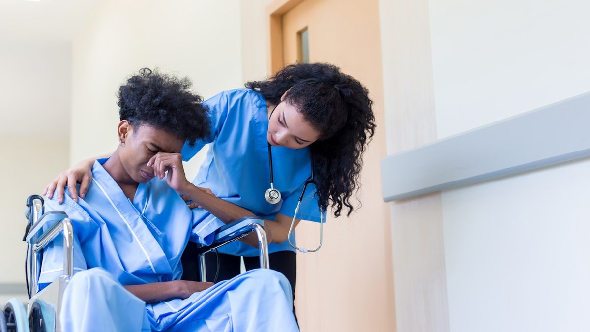 Nurse with pediatric patient