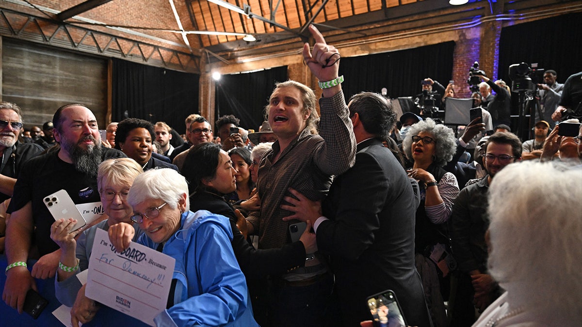 A protestor yelling