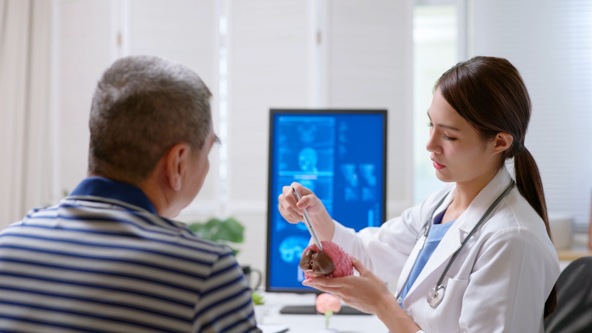 Dementia doctor with patient