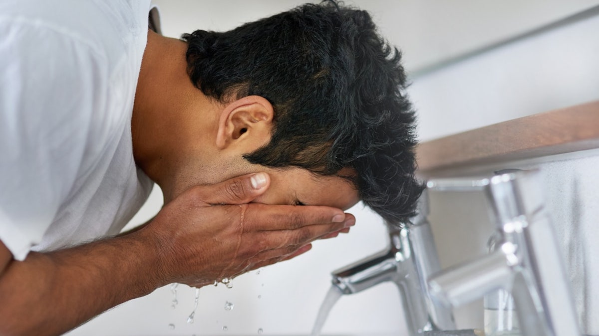 Man washing face