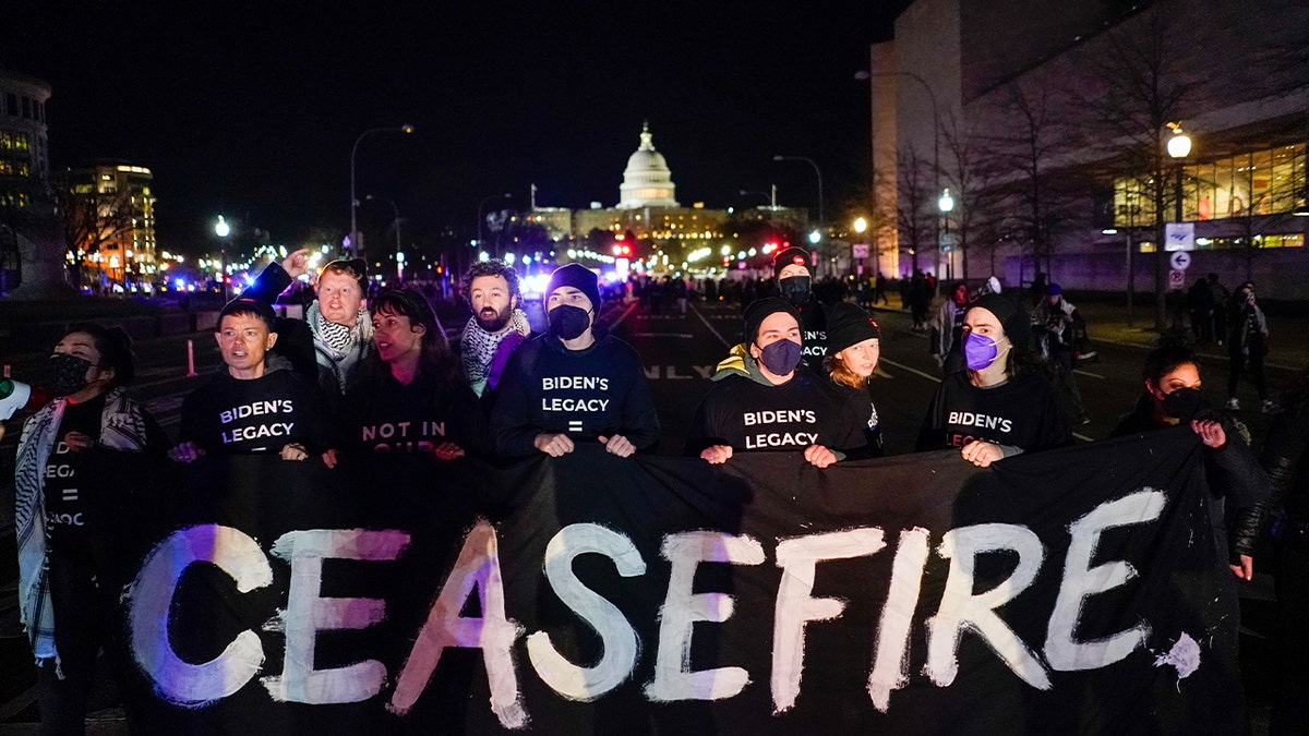 protesters with Jewish Voice for Peace demonstrate outside of the State of the Union address