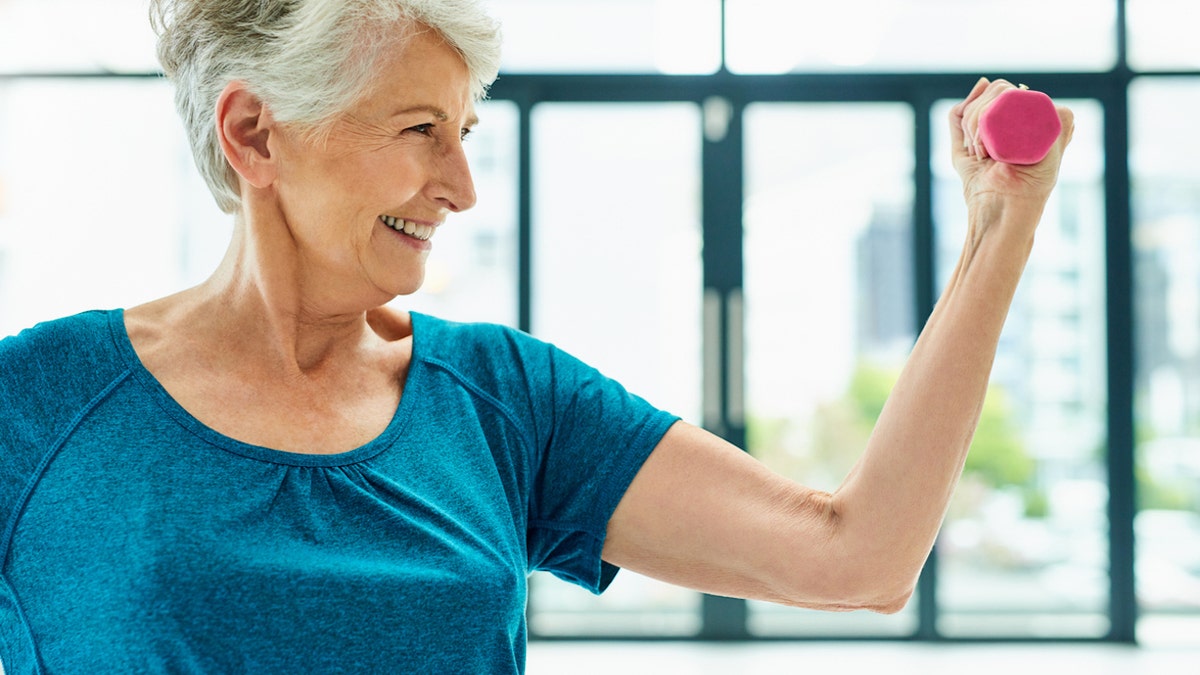 Woman lifting weight