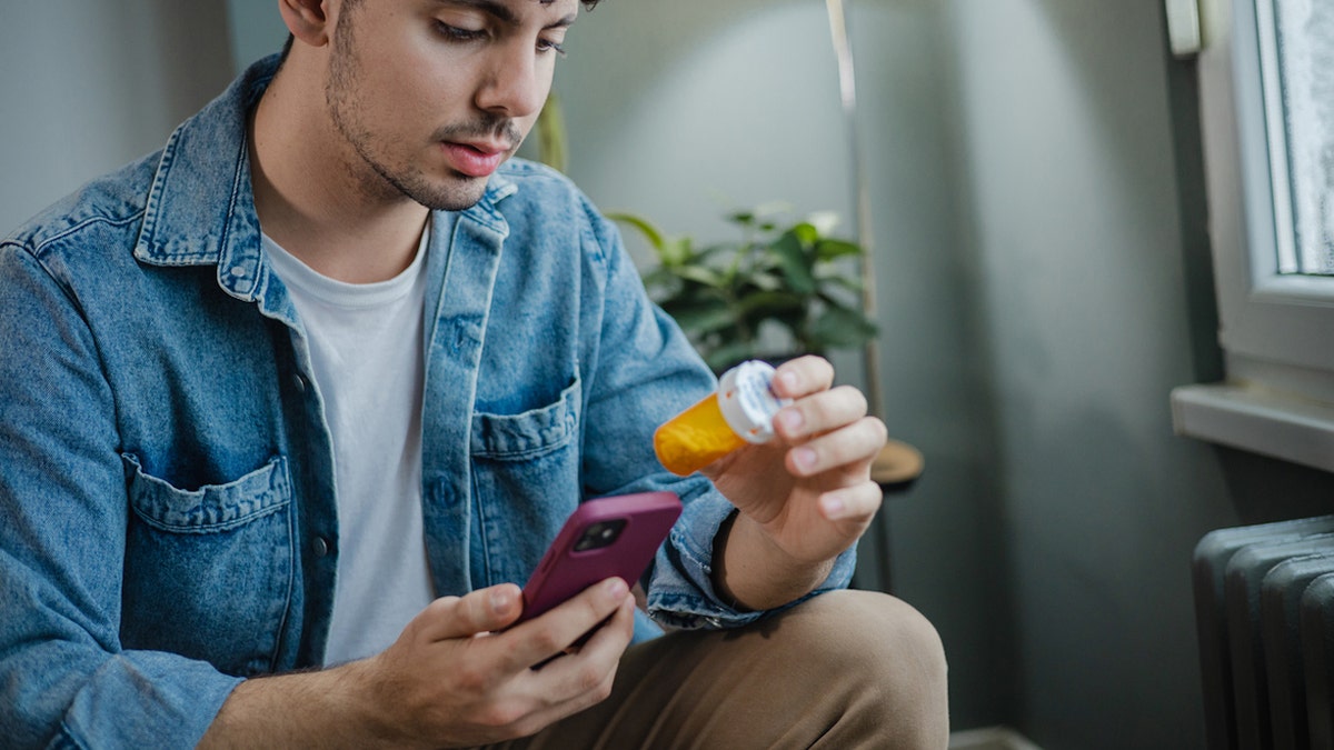 Teen boy pill bottle